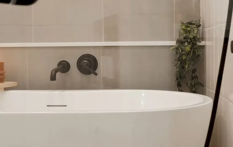 Plumbing technician working on visible pipe connections for Plumber Serving Avondale, AZ in Tolleson