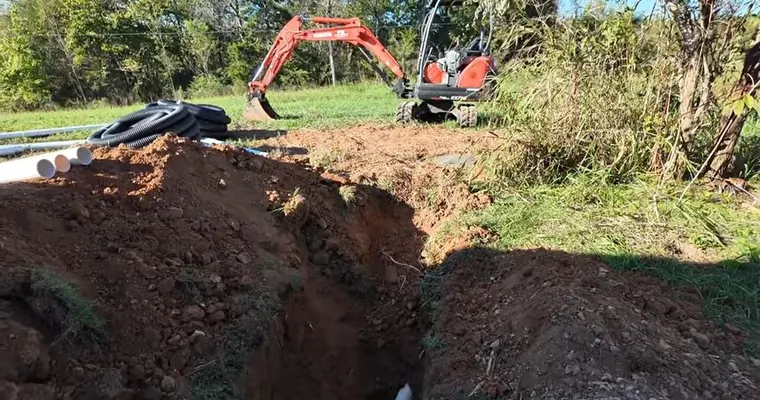 Plumbing technician working on visible pipe connections for Sewer Camera Inspection in Tolleson, AZ in Original Tolleson