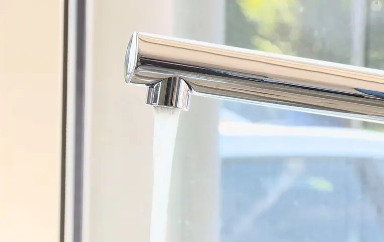 Sink faucet and drain connection being adjusted under a cabinet for Plumber Serving North Tolleson, AZ
